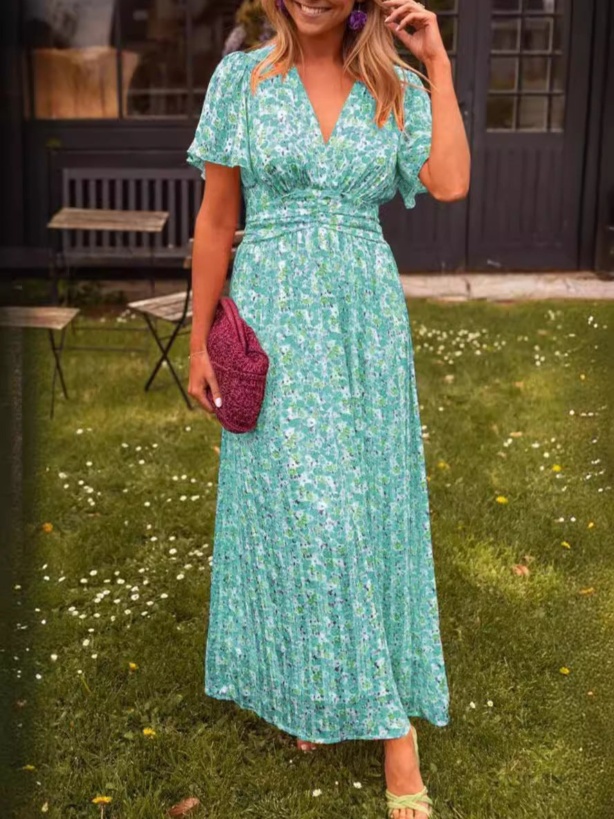 Elis – Abito lungo e vaporoso con stampa floreale